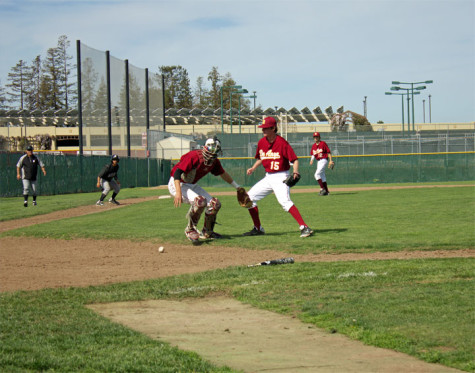 Freshman infiedler Marcus DiBenedetto (8) fields a bunt attempt by a Mission batter.