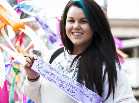 Brandy Roy, culinary chef, 22, writes her inspiration on a ribbon: "Be fearless when it comes to life and careless what others think and say about you!"